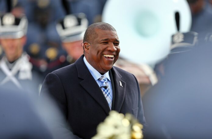 Curt Menefee smiles during filming of FOX NFL Sunday.