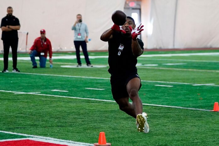 Christian Izien makes a catch during the Rutgers football pro day in Piscataway.