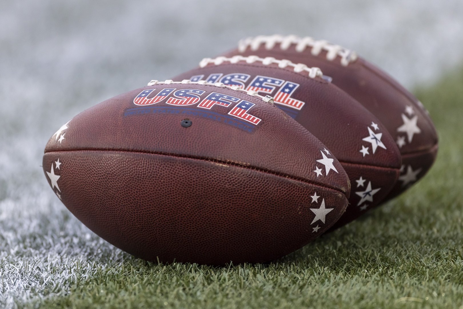 USFL balls sit at the ready during the first half at Protective Stadium.