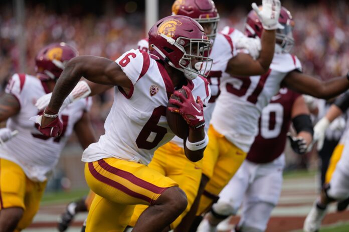 Mekhi Blackmon runs with the football during the first quarter against the Stanford Cardinal.
