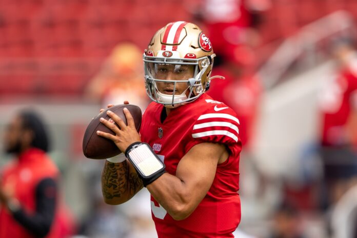 San Francisco 49ers QB Trey Lance (5) warms up before a game.