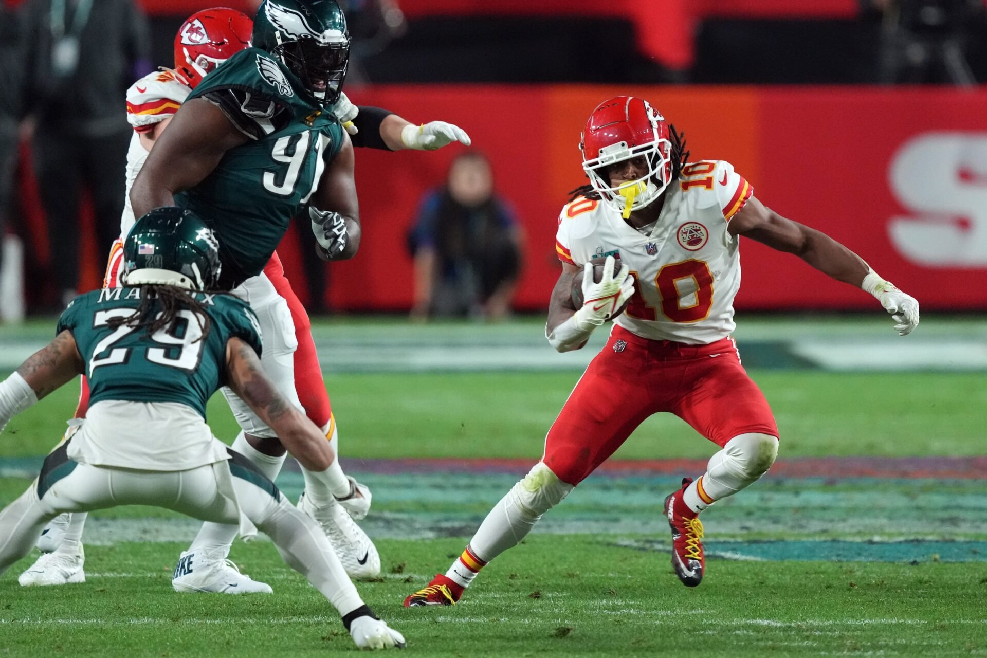 Kansas City Chiefs RB Isiah Pacheco (10) rushes the ball against the Philadelphia Eagles in Super Bowl LVII.