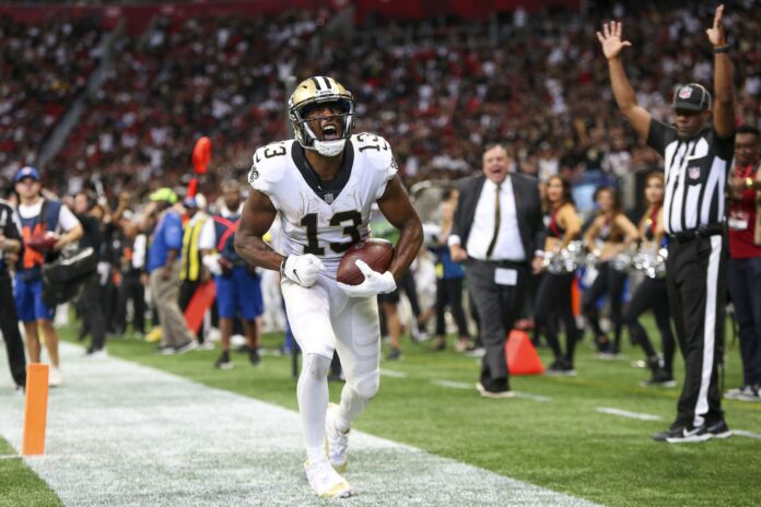 Michael Thomas (13) celebrates after a touchdown against the Atlanta Falcons in the fourth quarter at Mercedes-Benz Stadium.