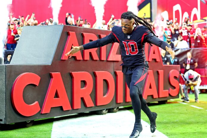DeAndre Hopkins (10) is introduced before playing against the New Orleans Saints at State Farm Stadium.