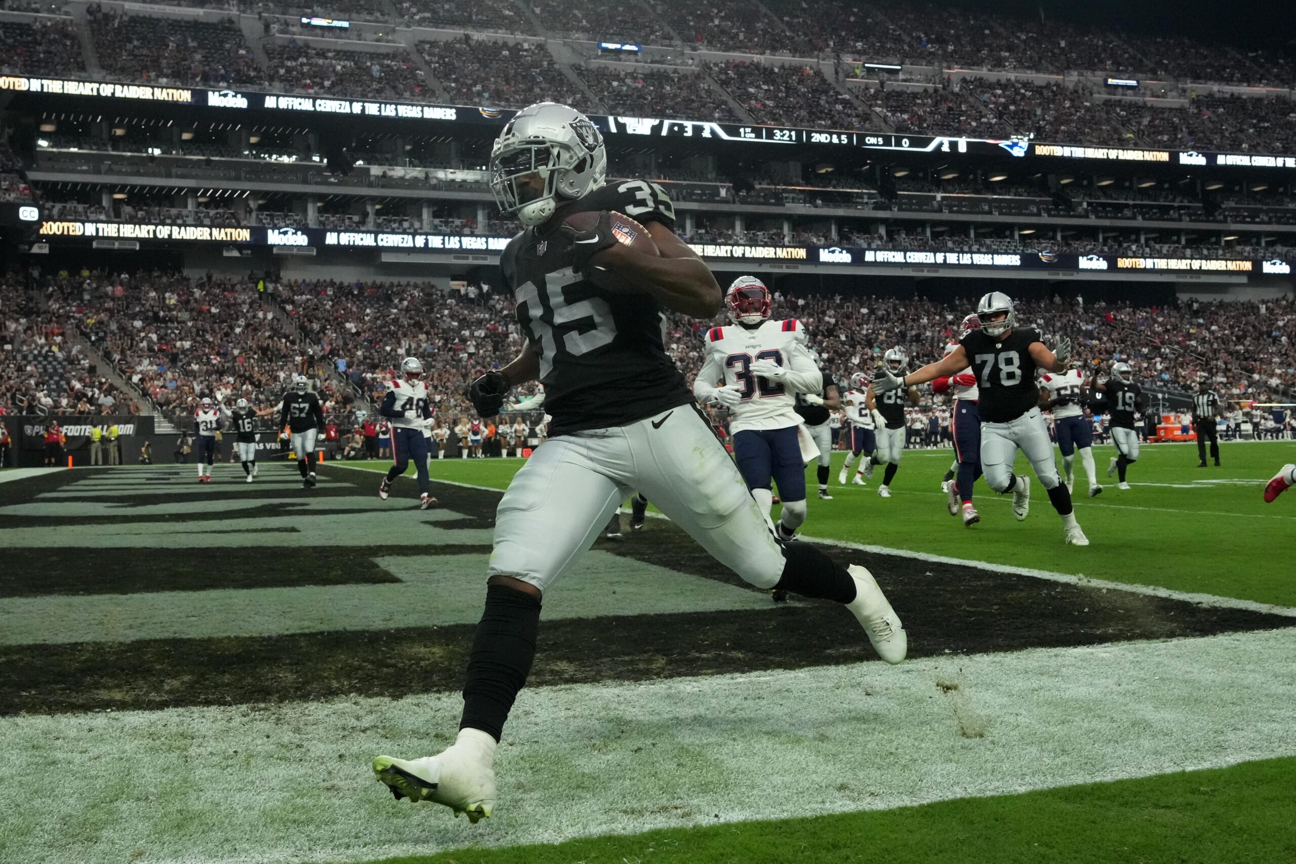 Las Vegas Raiders running back Zamir White (35) leaves the field