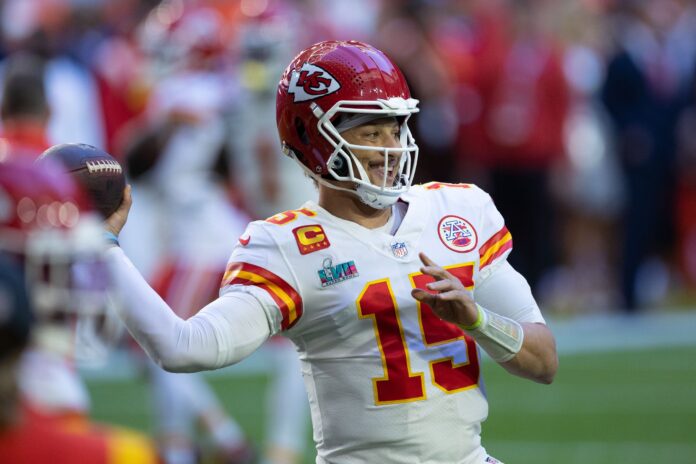 Kansas City Chiefs quarterback Patrick Mahomes (15) warms up