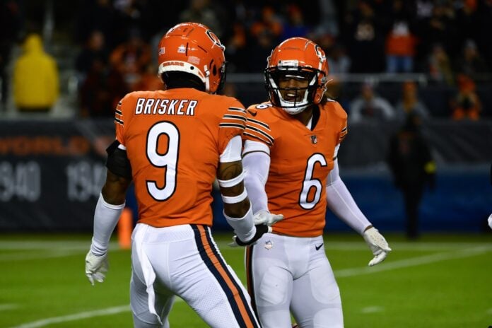 Chicago Bears safety Jaquan Brisker (9) reacts against the New