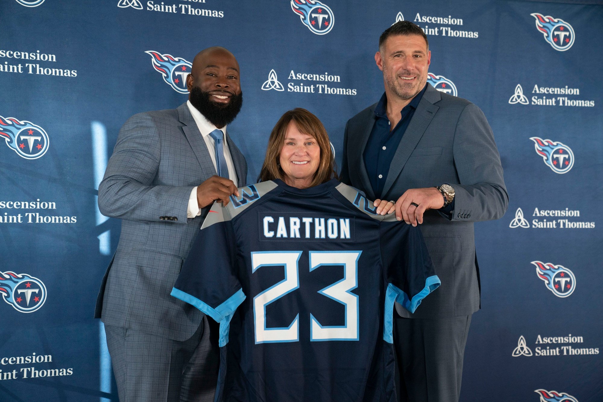 Tennessee Titans new general manager Ran Carthon poses with controlling owner Amy Adams Strunk and head coach Mike Vrabel.