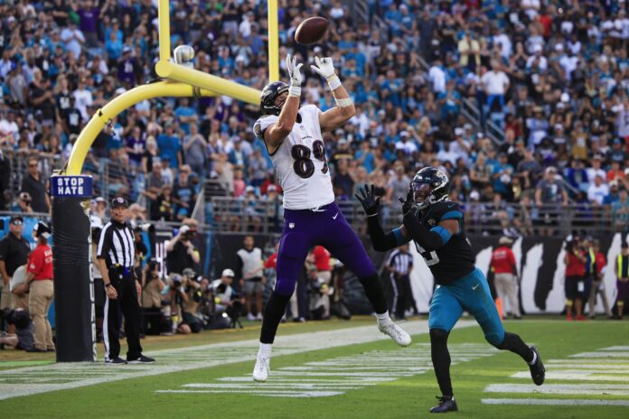 AFC tight end Mark Andrews, of the Baltimore Ravens, (89) scores a  touchdown, during the first …