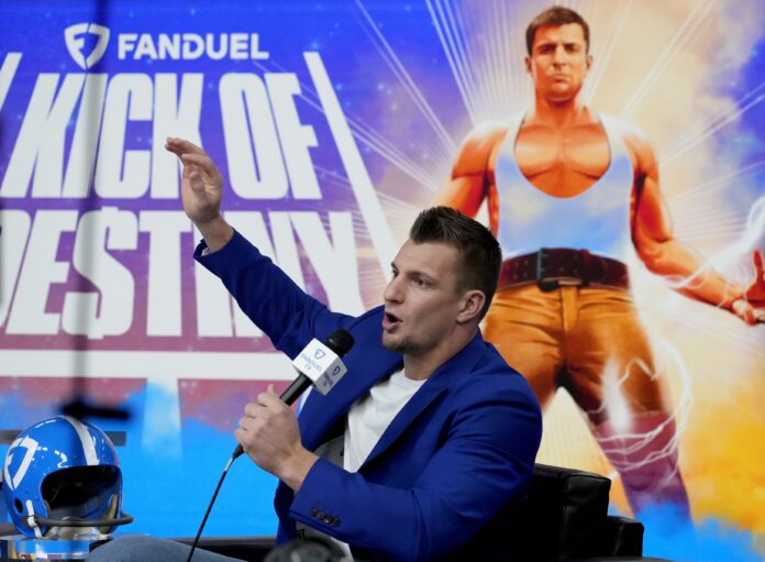 Rob Gronkowski talks about the Kick of Destiny during a press conference at the Phoenix Convention Center.