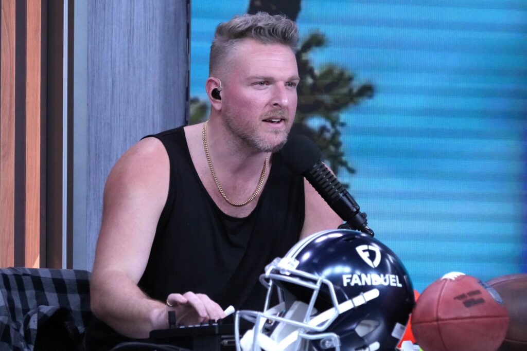 Who is ex-NFL player Pat McAfee and when did he sign to WWE?