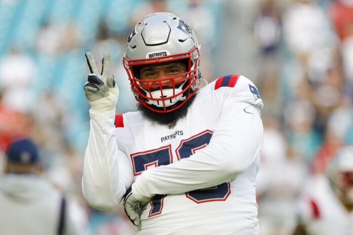 Isaiah Wynn (76) reacts from the field prior to the game against the Miami Dolphins at Hard Rock Stadium.