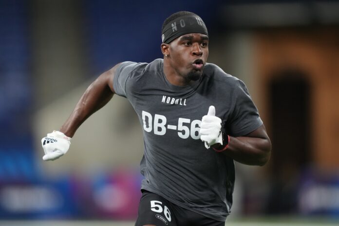DB Gervarrius Owens participates in drills at the NFL Scouting Combine.