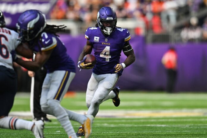 Dalvin Cook of the Minnesota Vikings runs with the ball during the