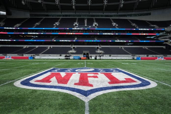 general overall view of the NFL shield logo at midfield Tottenham Hotspur Stadium.