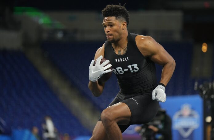 Roschon Johnson (RB13) during the NFL Scouting Combine at Lucas Oil Stadium.