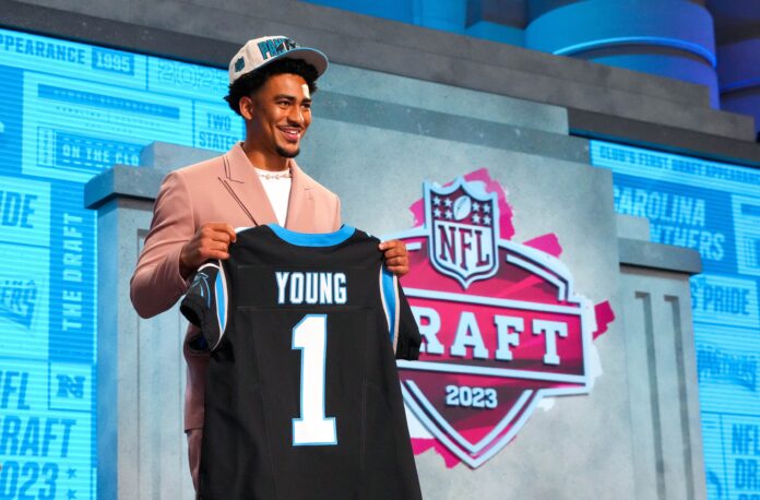 Alabama quarterback Bryce Young on stage after he was drafted first overall by the Carolina Panthers in the first round.