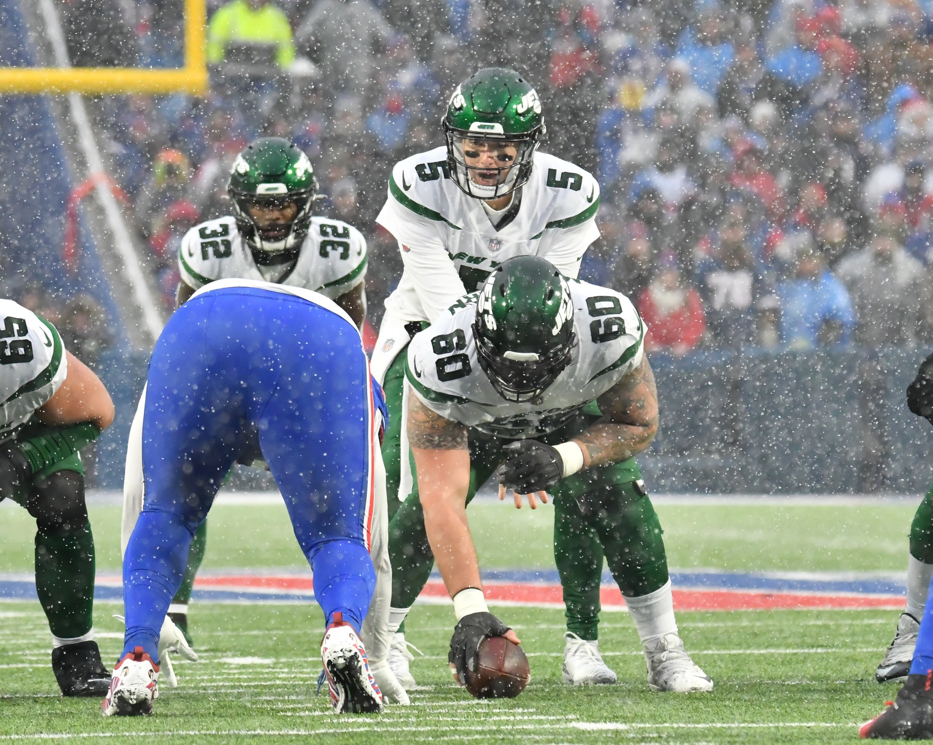 Mike White (5) and center Connor McGovern (60) prepare to snap the ball against the Buffalo Bills in the fourth quarter at Highmark Stadium.