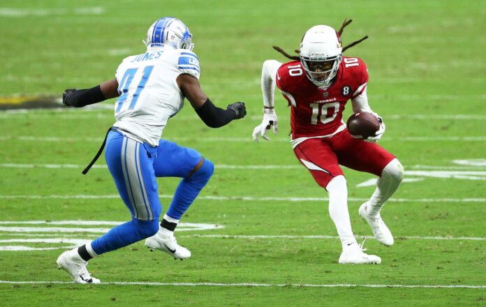 Arizona Cardinals WR DeAndre Hopkins (10) makes a move with the ball against the Detroit Lions.
