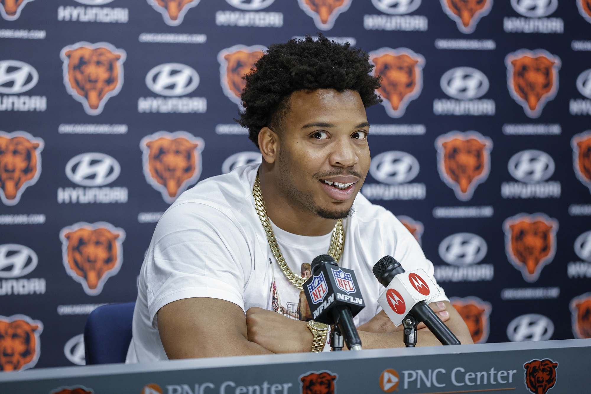 DeMarcus Walker speaks during a press conference at Halas Hall.