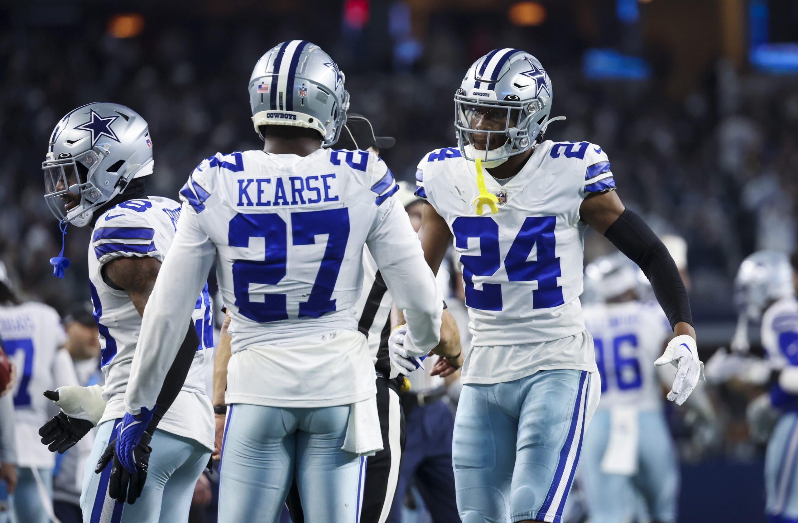 Jayron Kearse (27) celebrates with Dallas Cowboys safety Israel Mukuamu (24) after a fourth down play during the fourth quarter against the Philadelphia Eagles.