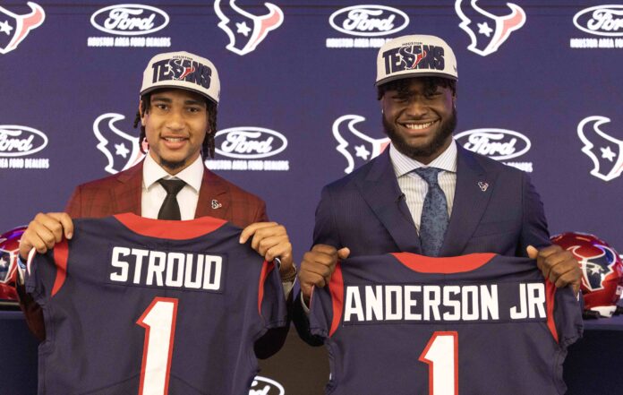 CJ Stroud (left), second overall pick in the 2023 NFL Draft, and Texans linebacker Will Anderson Jr., third overall pick in the 2023 NFL Draft, pose for a photo at a press conference at NRG Stadium.