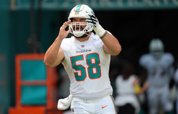 Miami Dolphins guard Connor Williams (58) takes the field before the game.