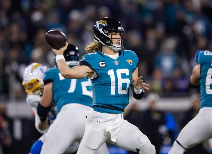 Trevor Lawrence (16) against the Los Angeles Chargers during a wild card game at TIAA Bank Field.