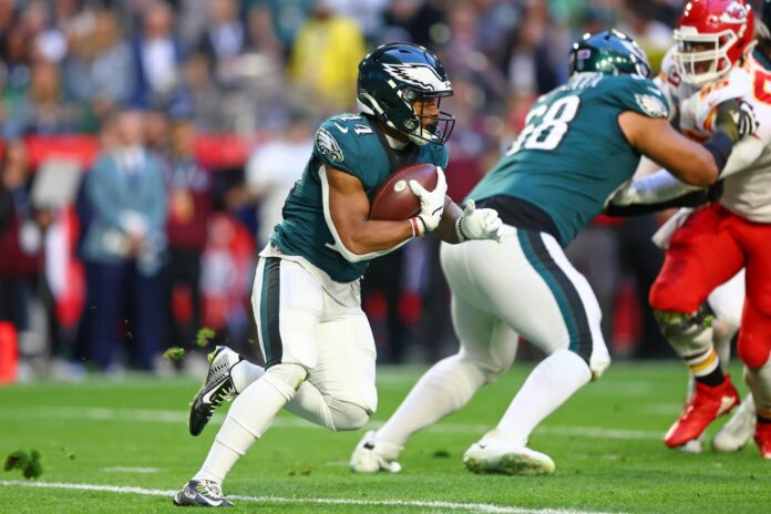 Philadelphia Eagles running back Kenneth Gainwell (14) walks off