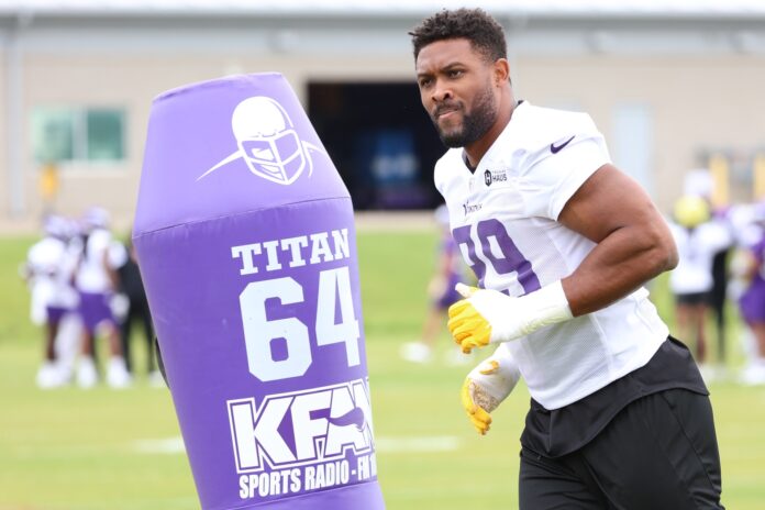 Danielle Hunter (99) performs a drill during mandatory mini camp at TCO Performance Center.