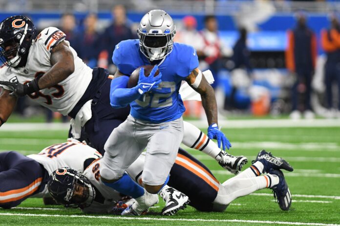 Detroit Lions running back D'Andre Swift (32) is tackled by