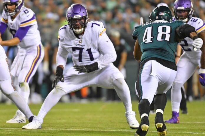 Minnesota Vikings offensive tackle Christian Darrisaw (71) is shown during  the second half of an NFL