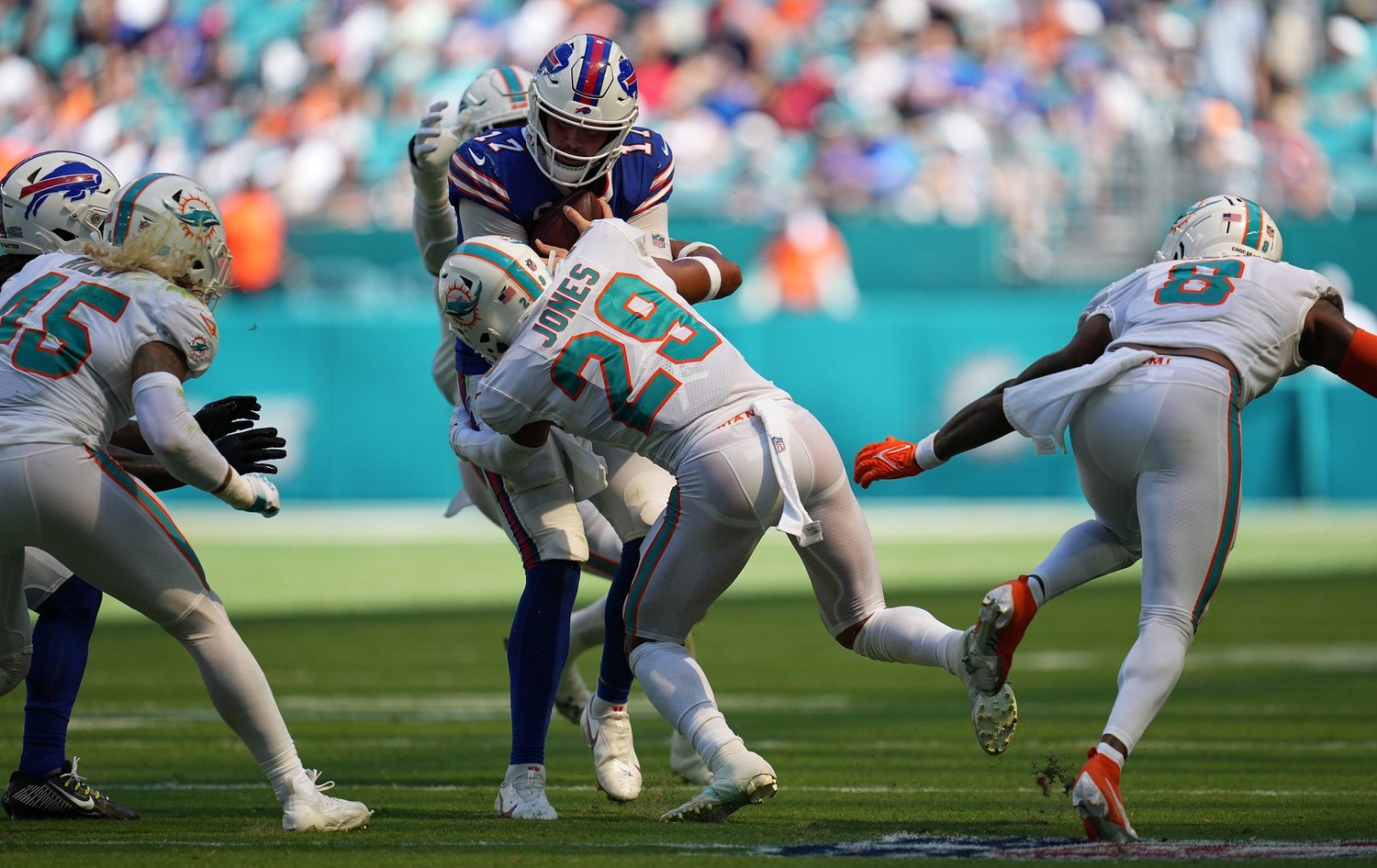 Miami Dolphins safety Brandon Jones (29) eyes the quarterback as he drops  back in coverage during an NFL football game against the Buffalo Bills,  Sunday, Sept. 25, 2022 in Miami Gardens, Fla.