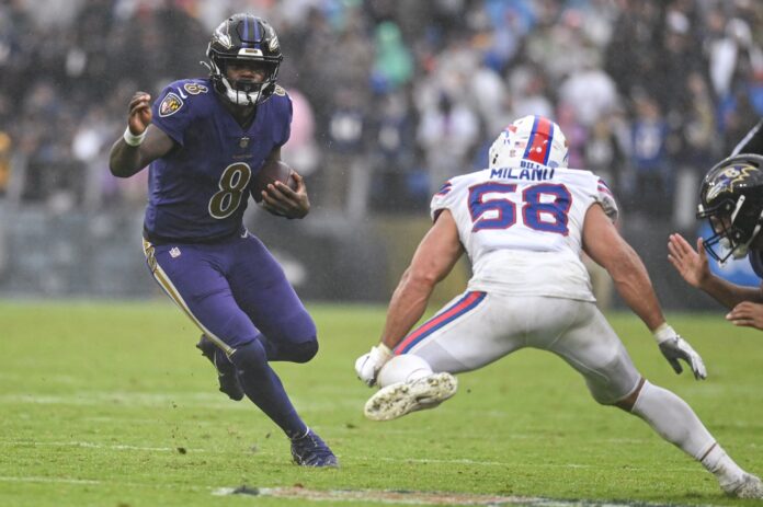 Quarterback Lamar Jackson of the Baltimore Ravens rushes against the