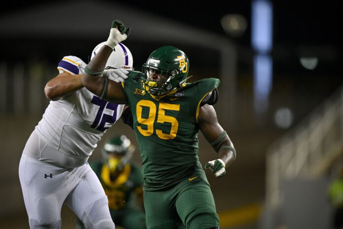 Gabe Hall (95) in action during the game between the Baylor Bears and the Albany Great Danes at McLane Stadium.