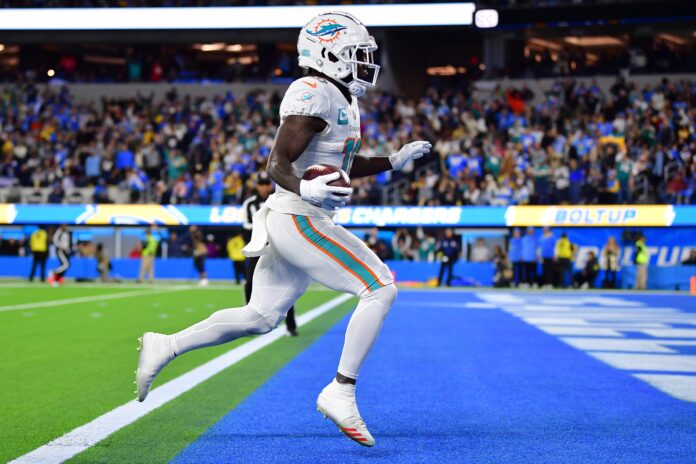 Miami Dolphins wide receiver Tyreek Hill (10) runs in for a touchdown against the Los Angeles Chargers.