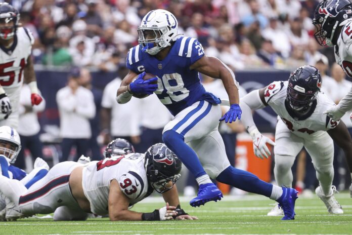 Indianapolis Colts RB Jonathan Taylor (28) rushes the ball against the Houston Texans.