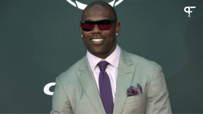 Terrell Owens arrives on the red carpet before the 2023 ESPYS at the Dolby Theatre..