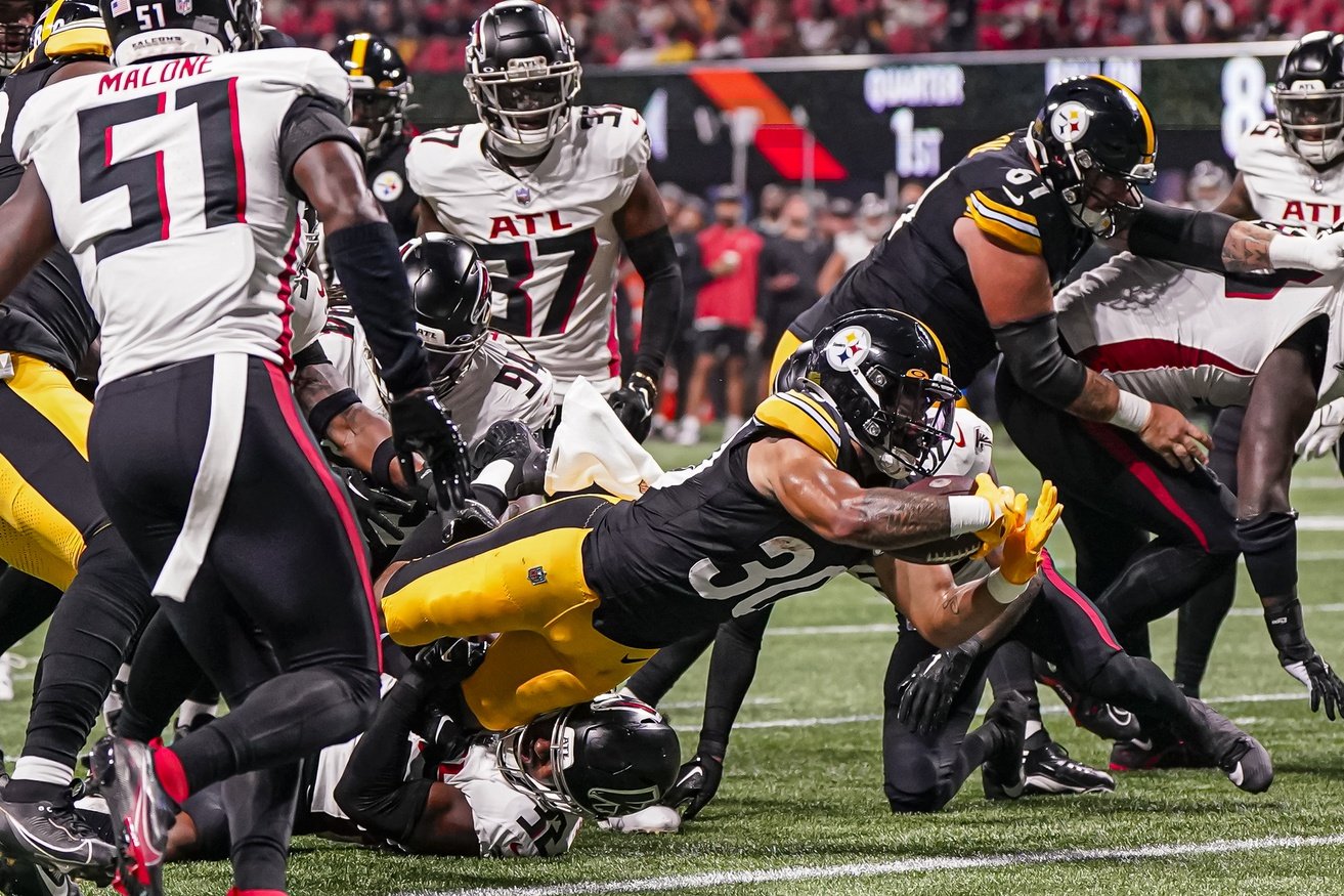 Atlanta Falcons safety Jaylinn Hawkins (32) lines up during the