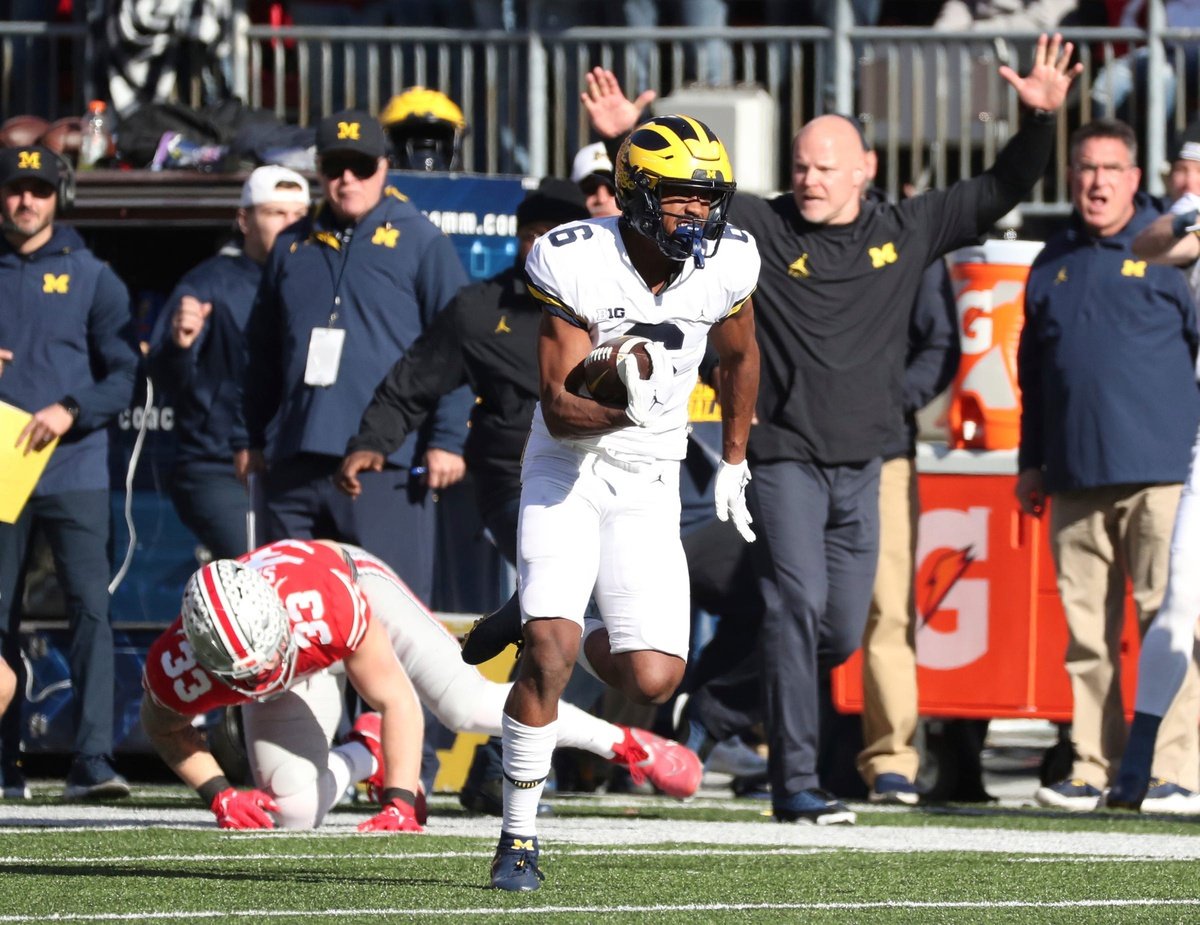 Cornelius Johnson (6) catches and runs for a touchdown against Ohio State.