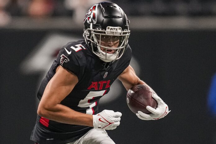 Atlanta Falcons wide receiver Drake London (5) works during the