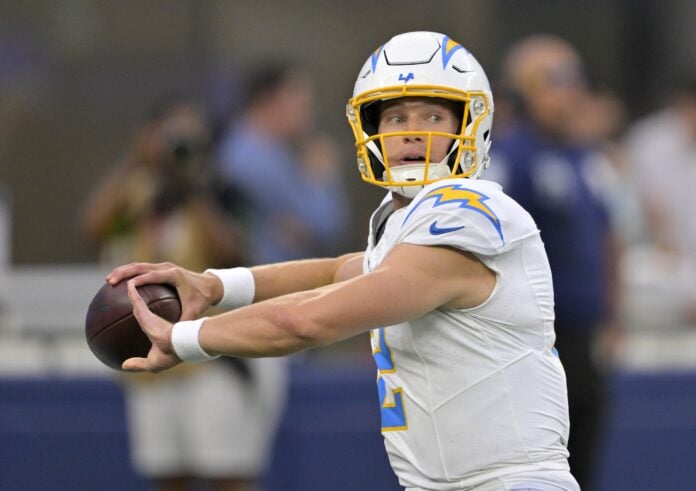 Easton Stick of the Los Angeles Chargers looks to pass during the