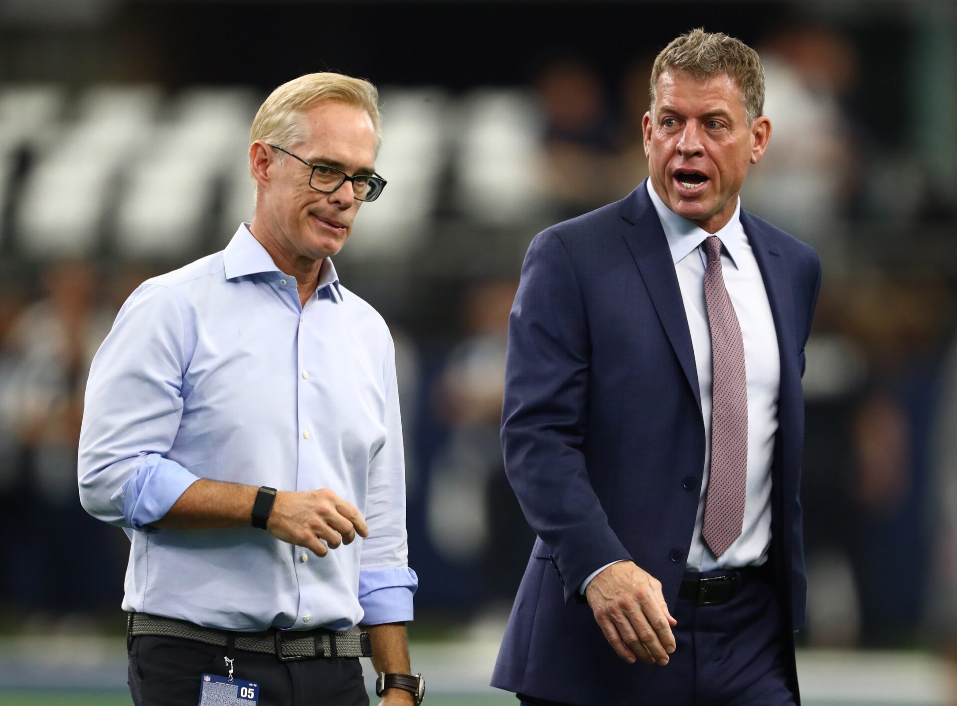Joe Buck and Troy Aikman on the field before a game.