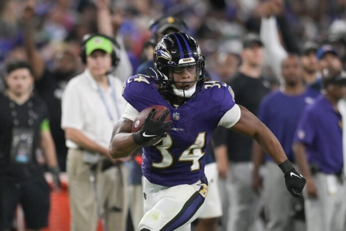 Baltimore Ravens running back Keaton Mitchell (34) rushes during the second half against the Philadelphia Eagles.