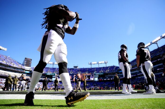 Baltimore Ravens running back Alex Collins (34) warms up prior to the game against the Pittsburgh Steelers at M&T Bank Stadium