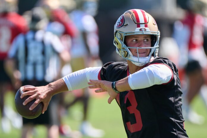 San Francisco 49ers quarterback Brock Purdy (13) throws a pass during training camp at the SAP Performance Facility.