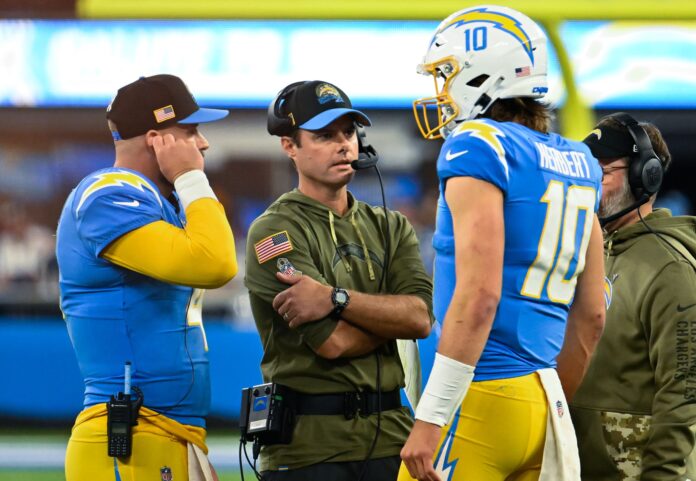 Los Angeles Chargers head coach Brandon Staley talks with QB Justin Herbert (10) during a game.