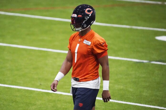 Justin Fields (1) during training camp at Halas Hall.