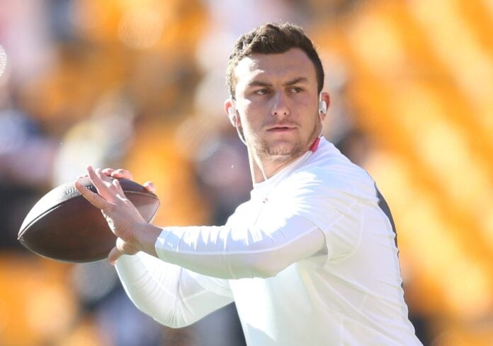 Johnny Manziel (2) warms up before playing the Pittsburgh Steelers at Heinz Field.