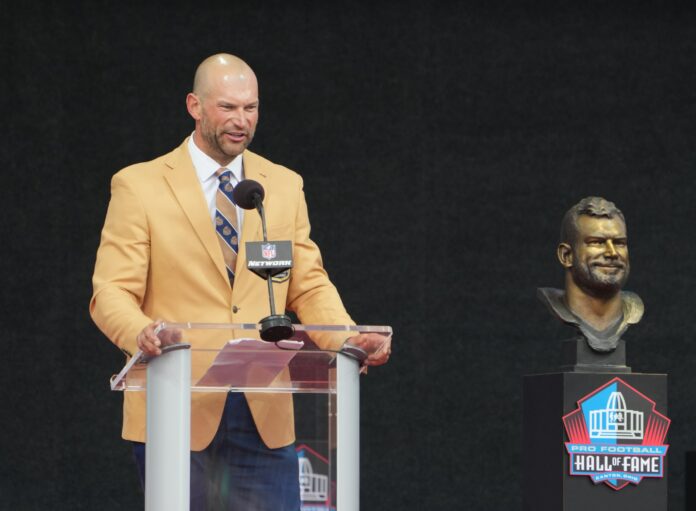Joe Thomas speaks after unveiling his bust during the 2023 Pro Football Hall of Fame Enshrinement at Tom Benson Hall of Fame Stadium.